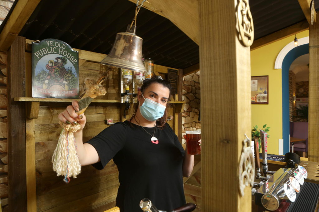 Activities Manager Natasha Evans in the new pub set up for residents at the Meddyg Care home in Porthmadog